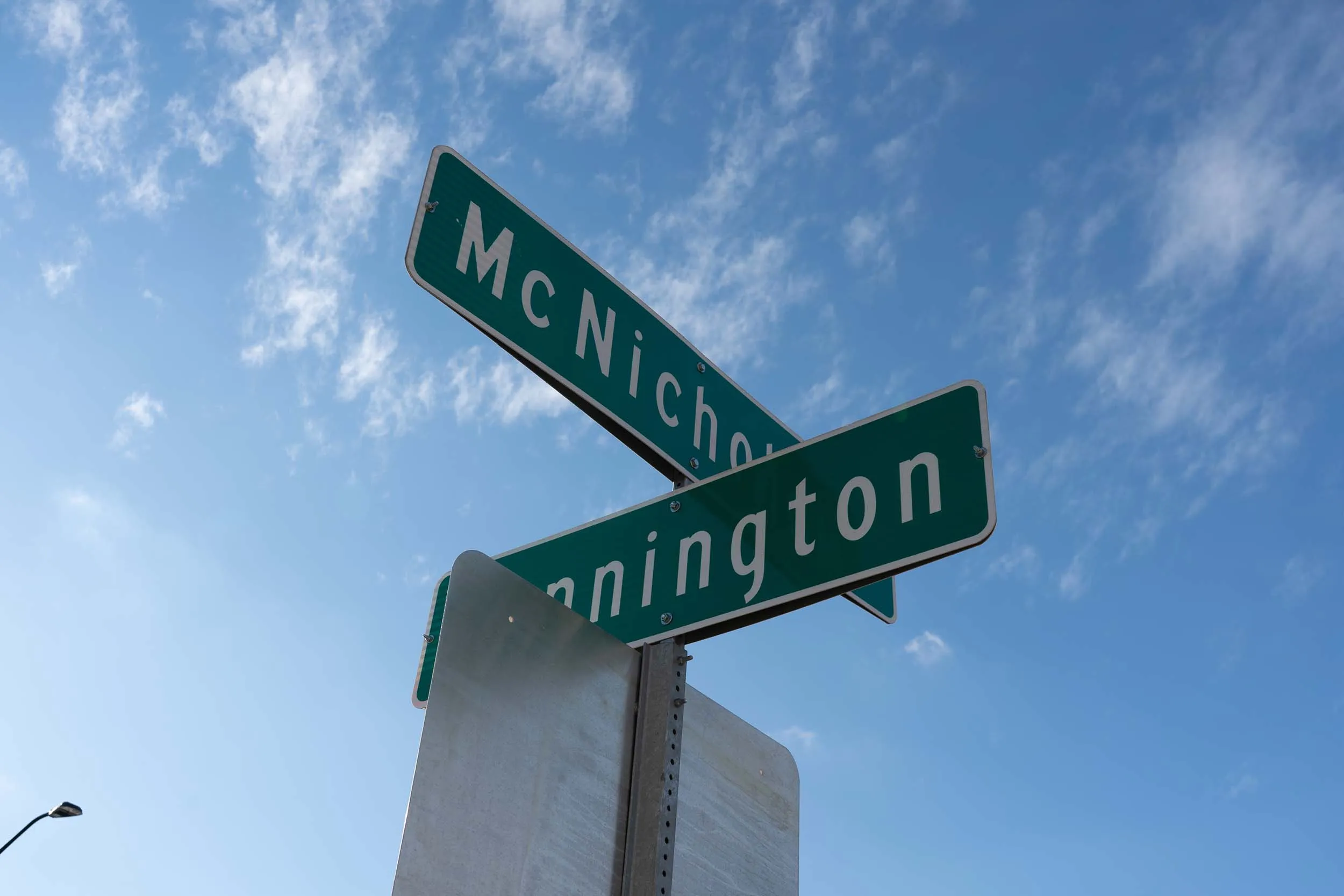 A street sign at the intersection of McNichols and Pennington