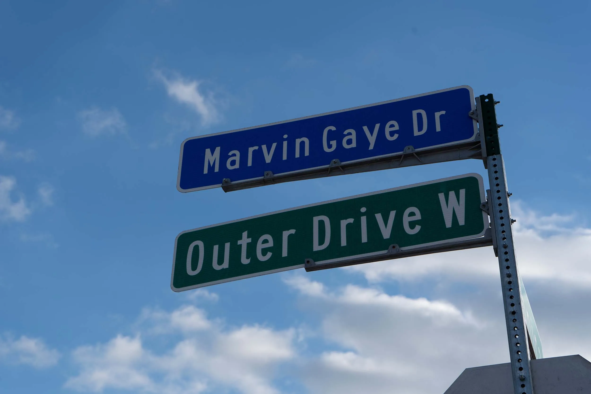 A street sign showing W. Outer Drive, also called Marvin Gaye Dr. in some segments